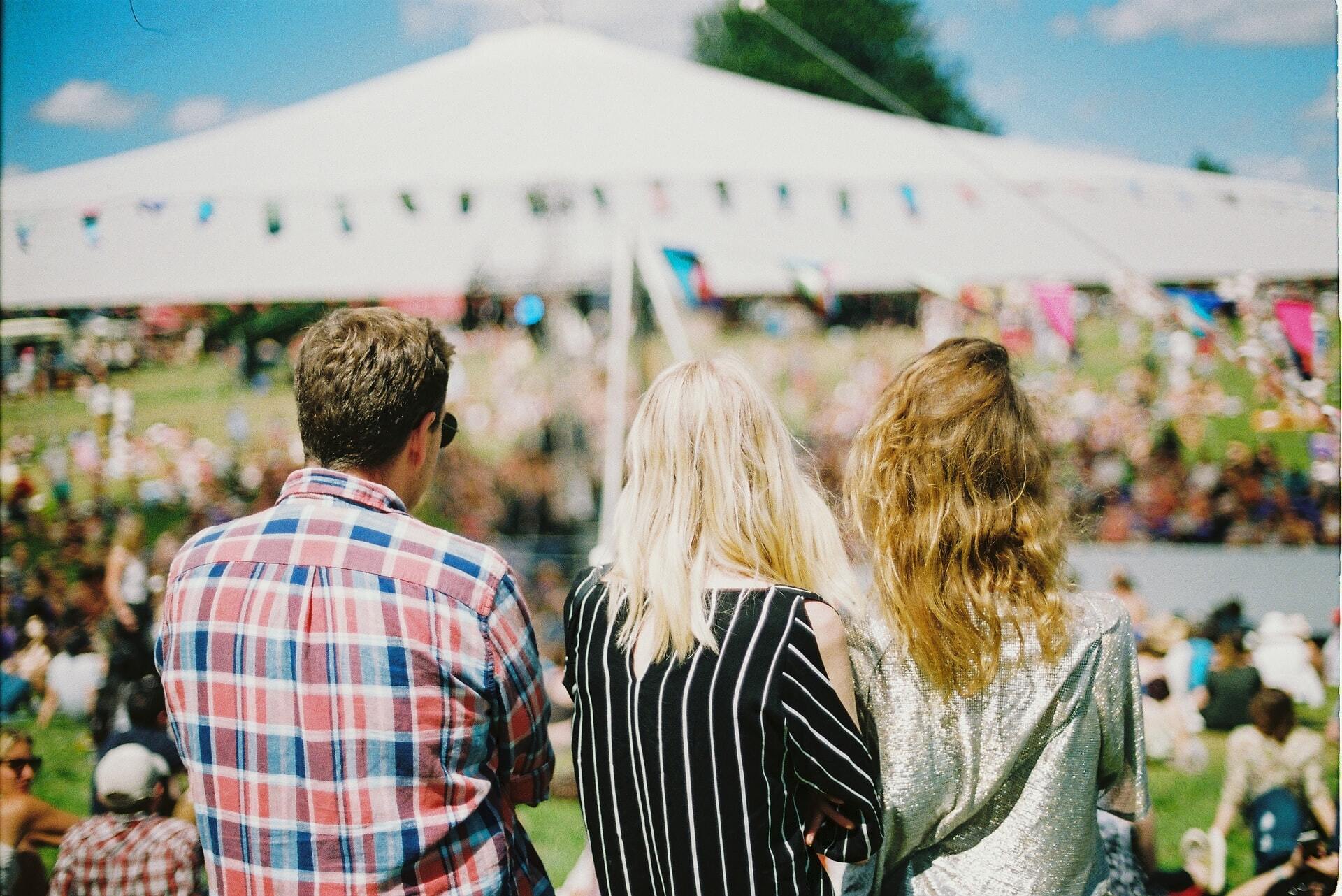 image of people at a festival | portable toilet seattle washington 