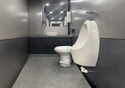 2-stall luxury restroom trailer interior.